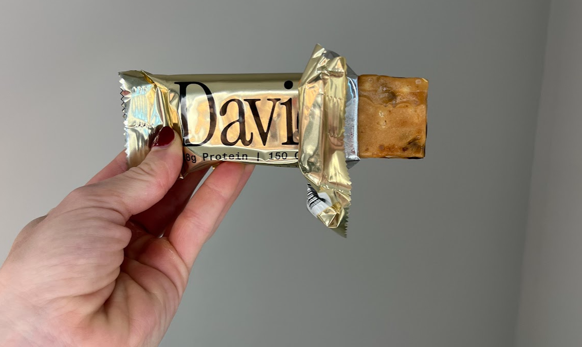 hand holding david protein bar