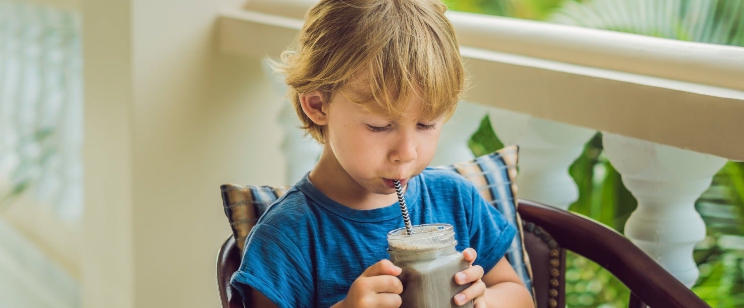 Child drinking smoothie | Should Your Child Be Taking a Protein Supplement?